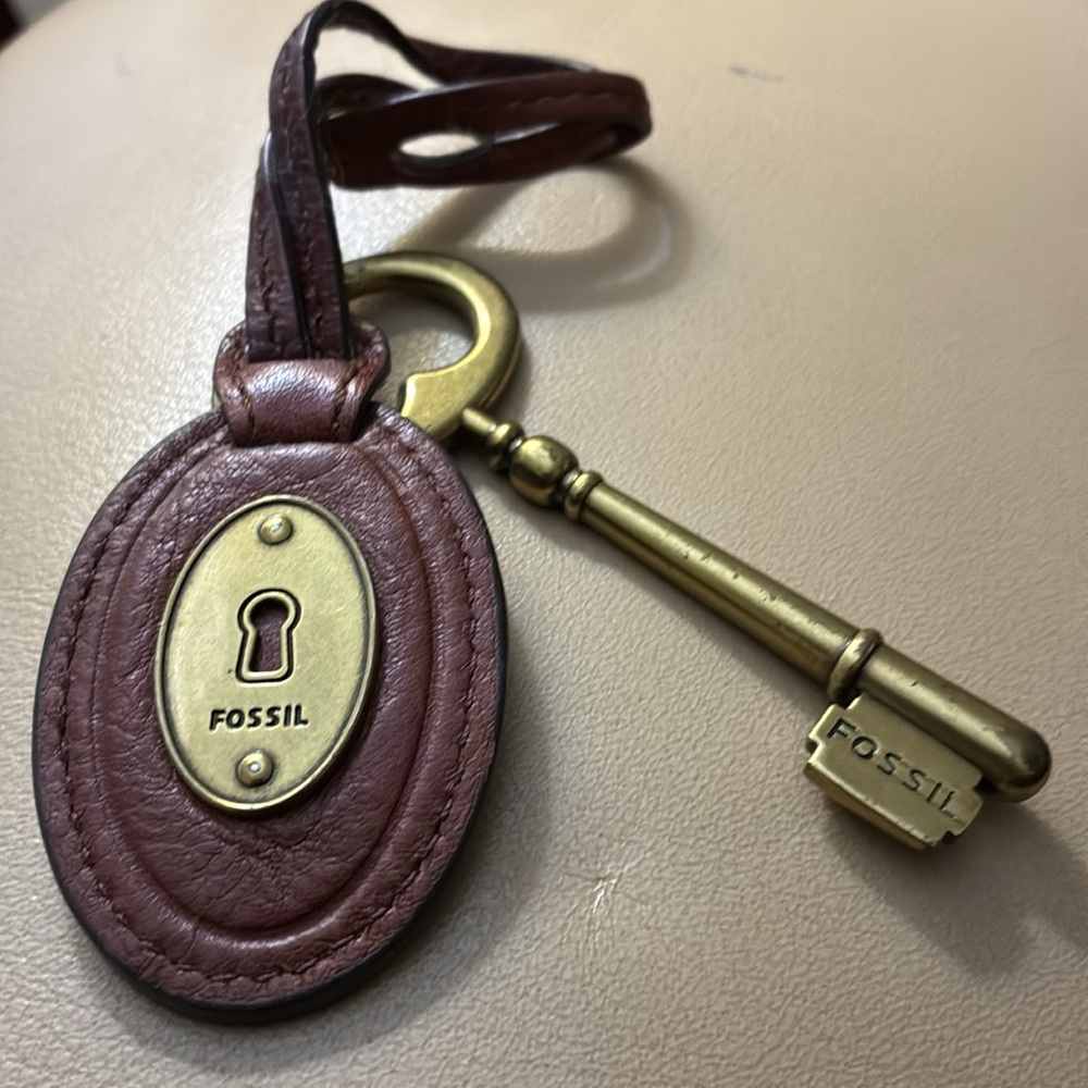 Fossil Leather hanging tag with vintage brass key